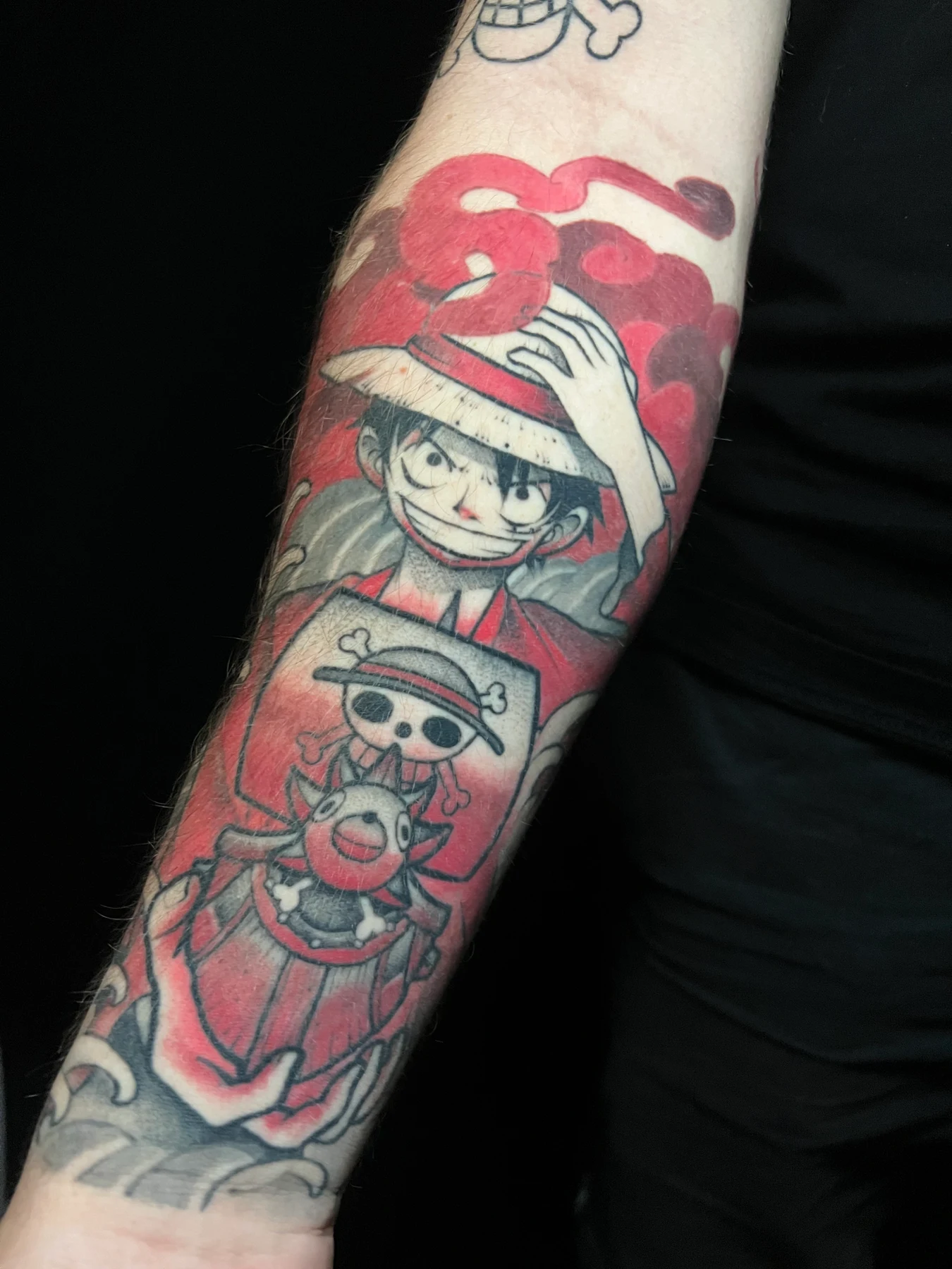 Tatouage manga réalisé par Sato, à Toulouse